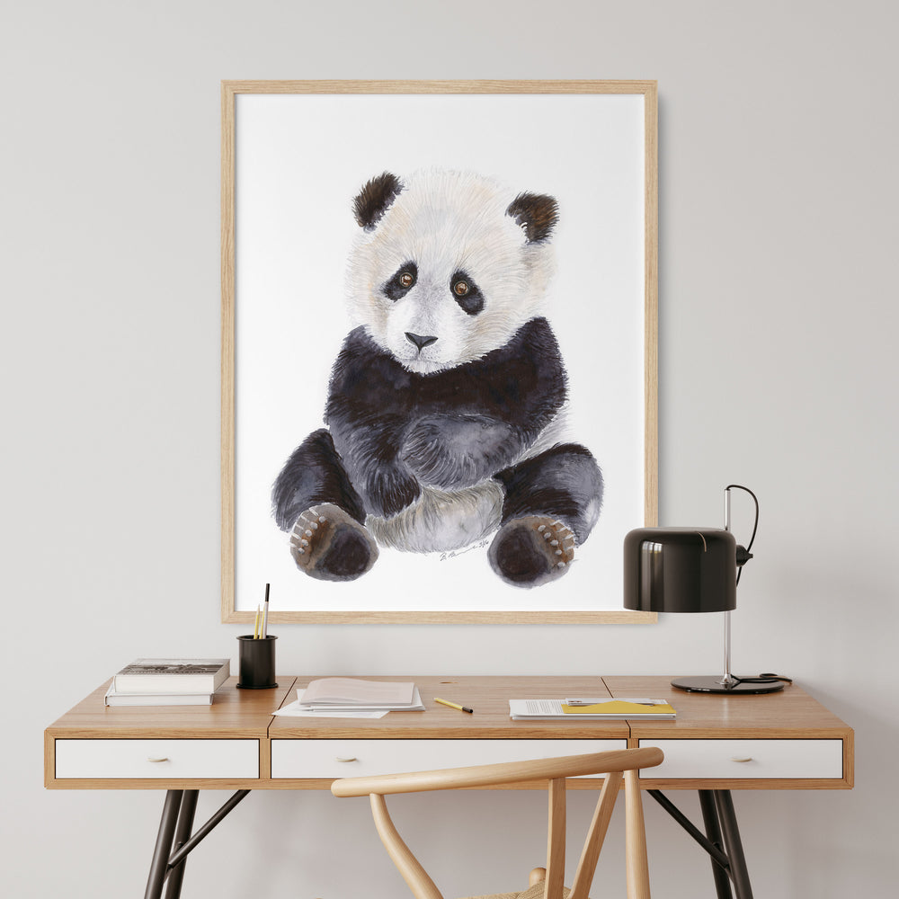 a picture of a baby panda bear
