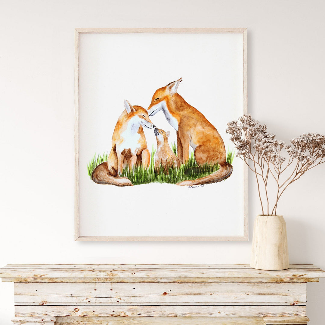 a picture of a couple of foxes sitting next to each other