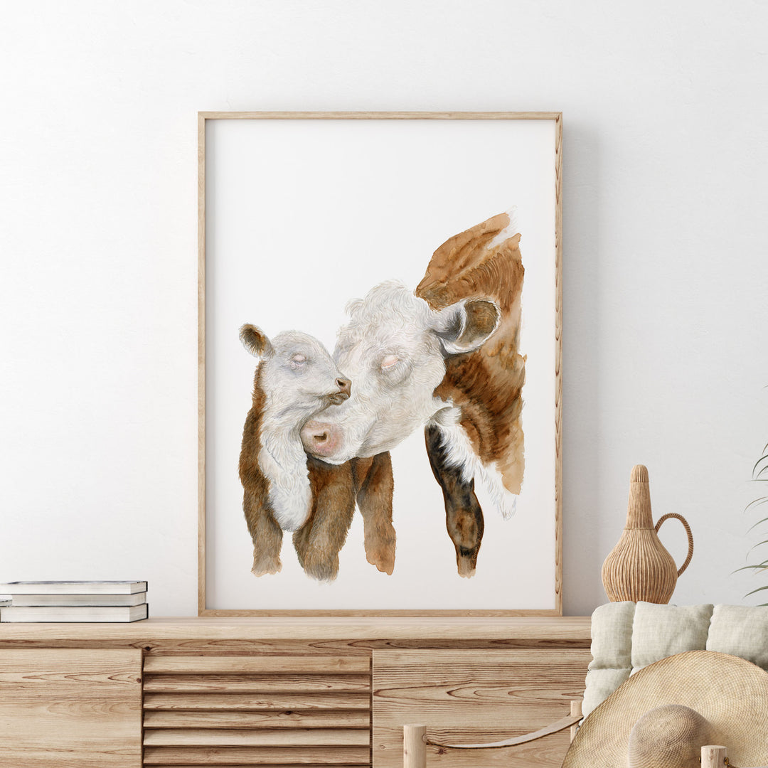 a picture of mother cow and her calf