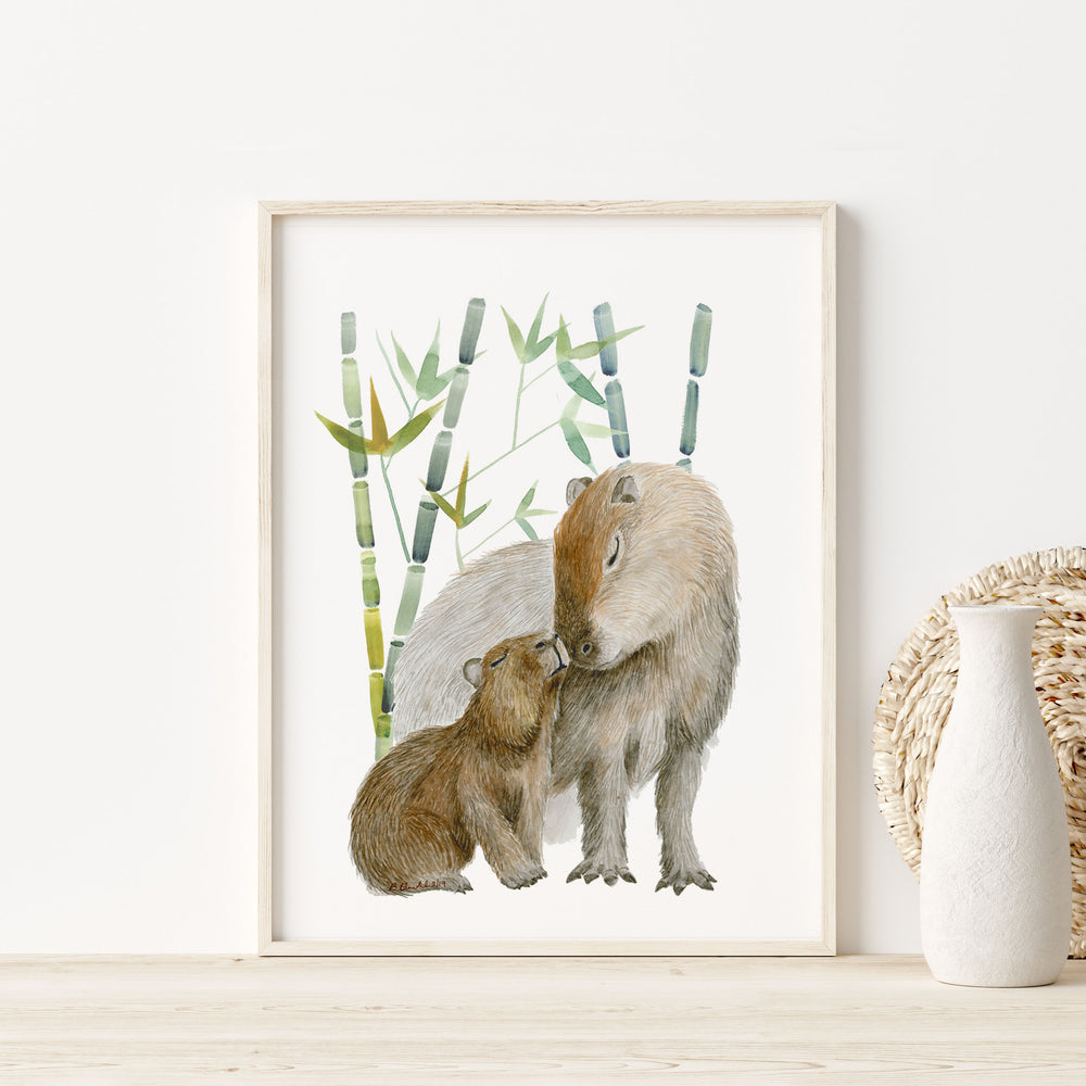 a picture of a mother capybara and her baby
