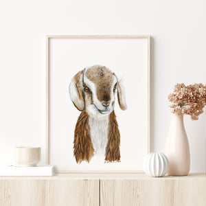 a painting of a brown and white goat on a shelf