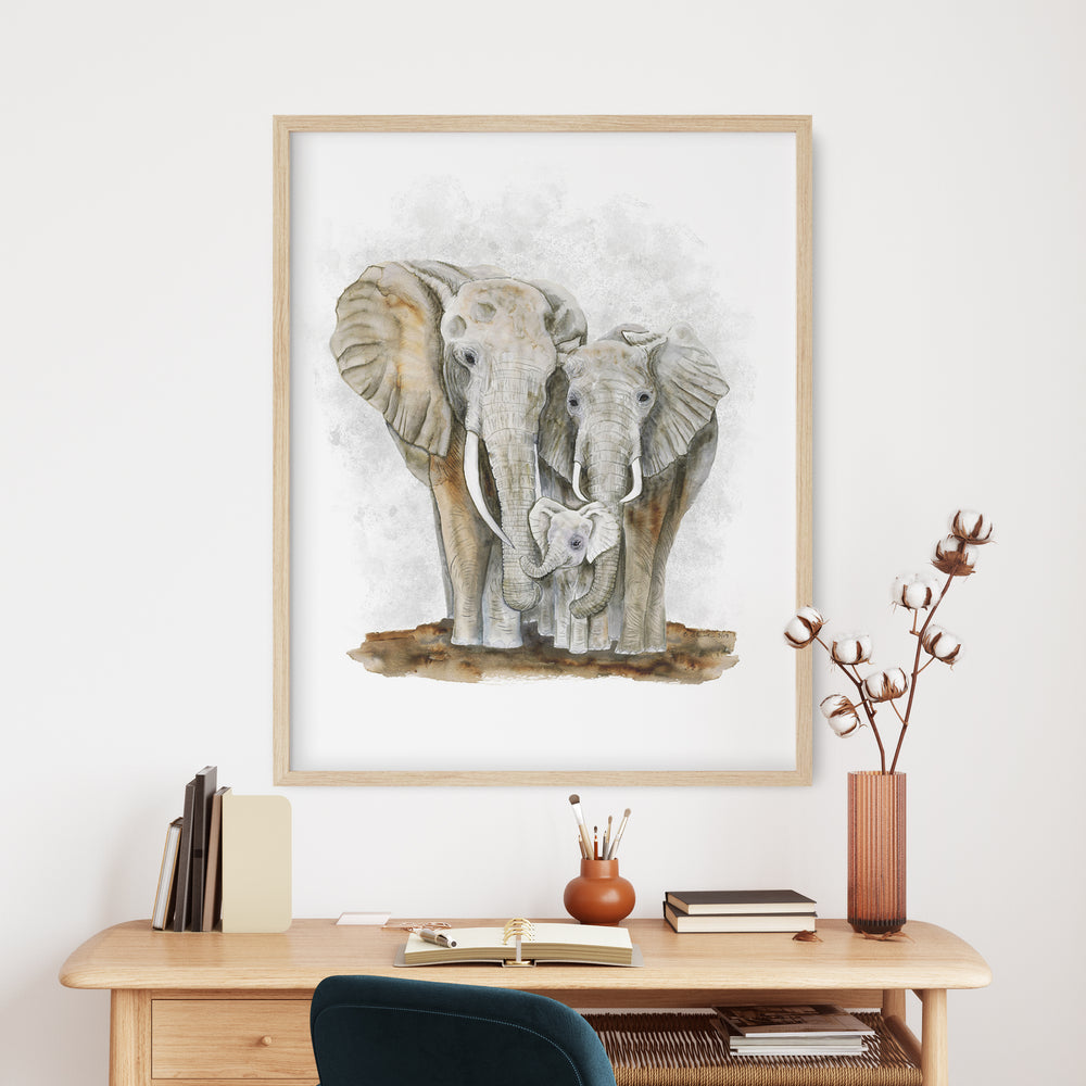 a painting of two elephants on a wall above a desk
