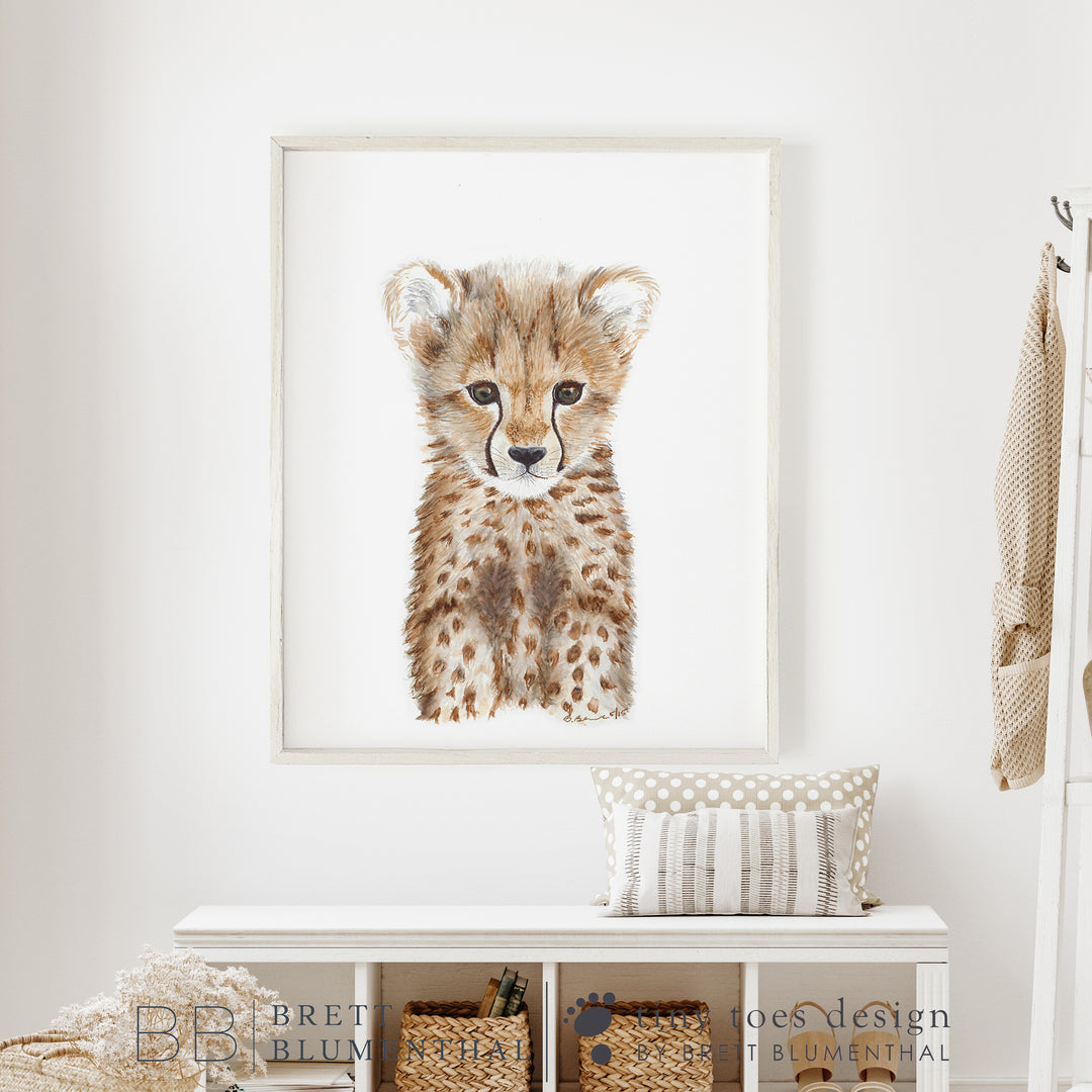 a picture of a baby cheetah in a white room