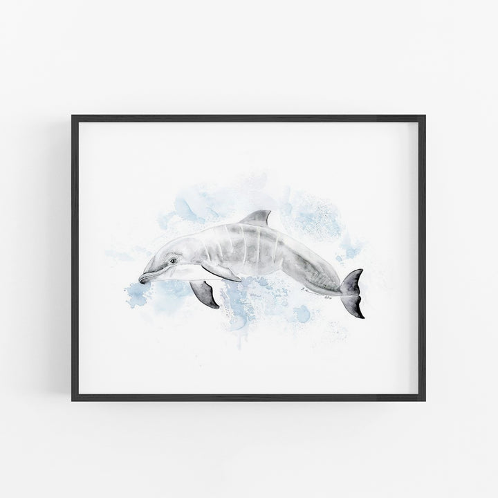 a watercolor painting of a dolphin in a black frame