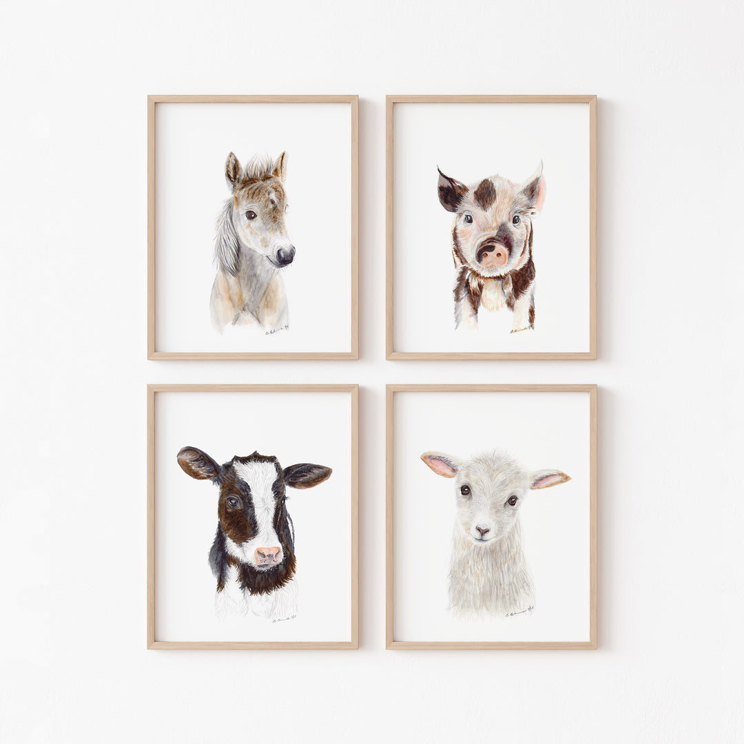Set of 4 farm animal prints featuring a horse foal, cow, pig, and sheep in light wood frames