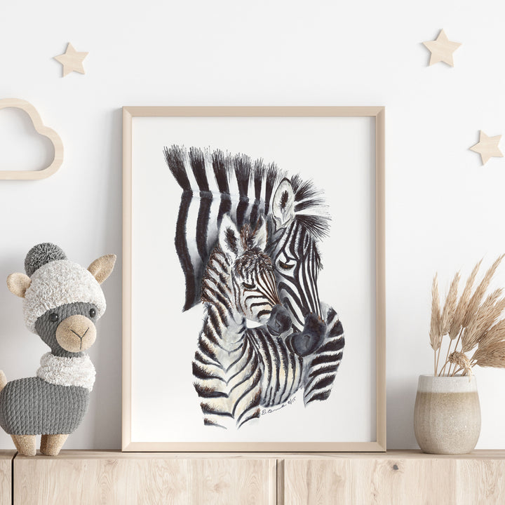 a picture of a zebra and her baby zebra