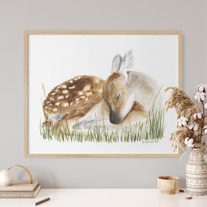 a painting of a deer and a fawn laying down in the grass