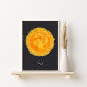 a picture of a sun on a shelf next to a vase