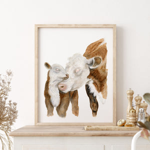 a picture of a cow and calf on a mantle
