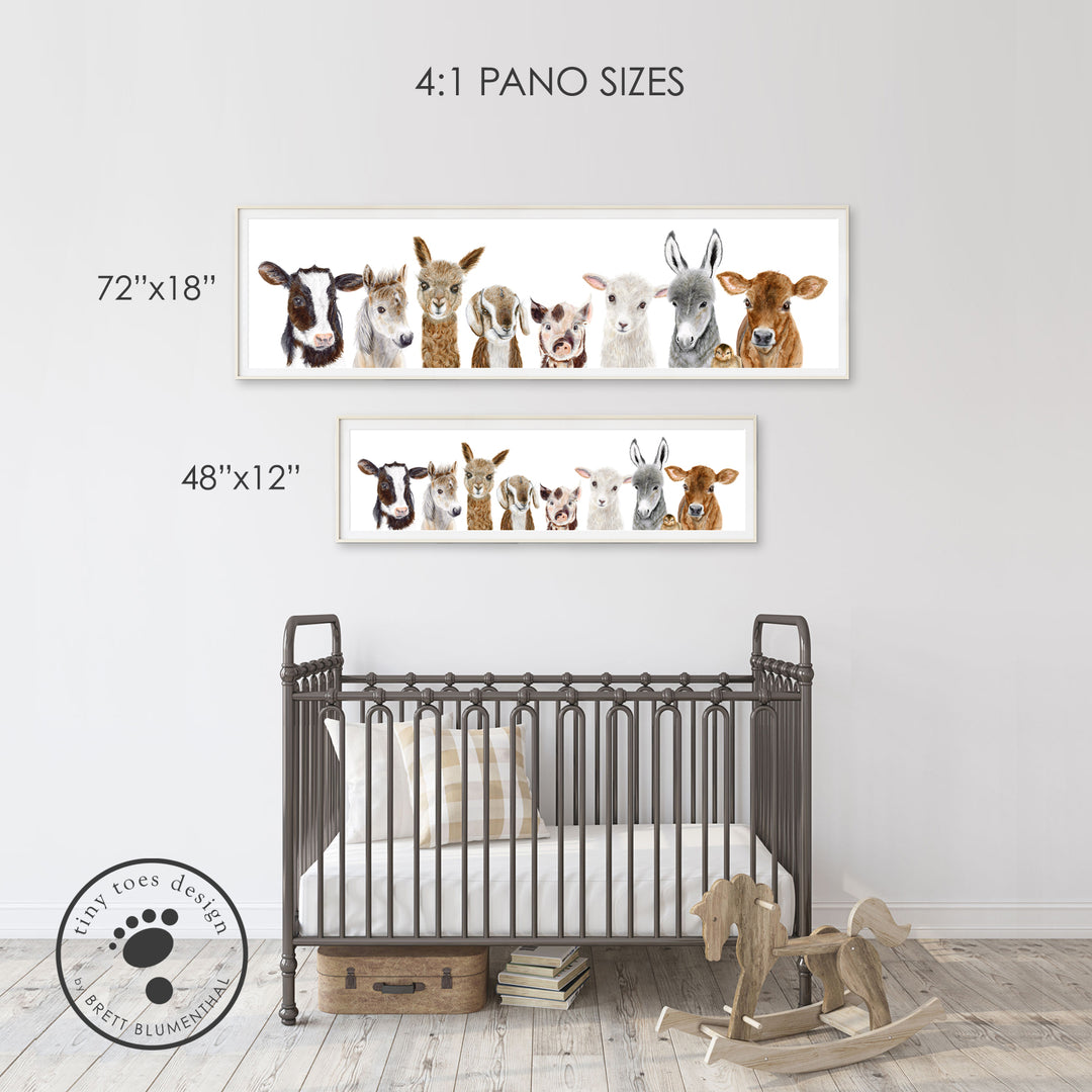 a baby's room with a crib and two pictures of animals on the