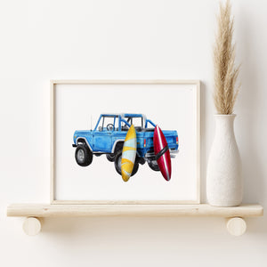a picture of a blue truck with surfboards on a shelf