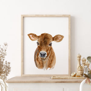 a picture of a brown cow is on a shelf