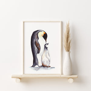a picture of a penguin and its chick
