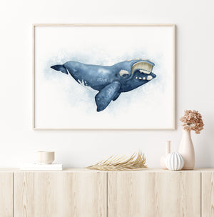 a picture of a whale in a frame on a wall