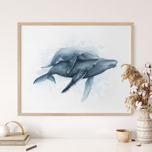 a watercolor of two whales in the water