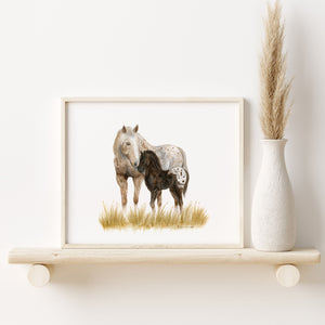 a painting of a horse and foal on a shelf