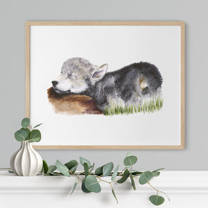 a painting of a wolf laying down in the grass
