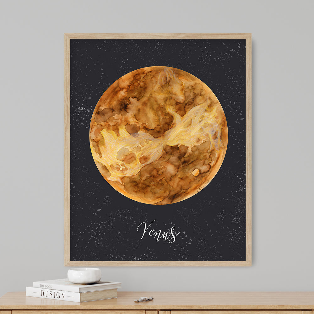 a painting of a planet on a wall above a dresser