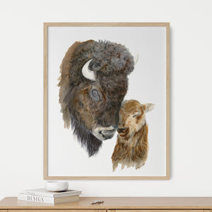a picture of a bison and a cow on a wall