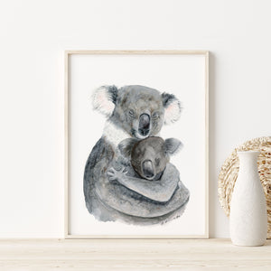 Mother koala holding her baby koala