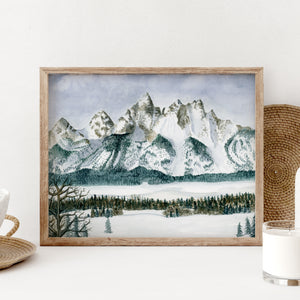 a picture of a snowy mountain range in a frame