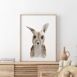 a picture of a kangaroo in a frame on a shelf