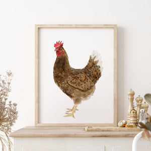 a picture of a chicken in a frame on a mantle