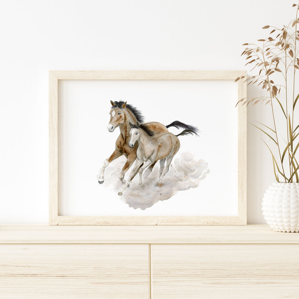 a picture of a mare and foal running