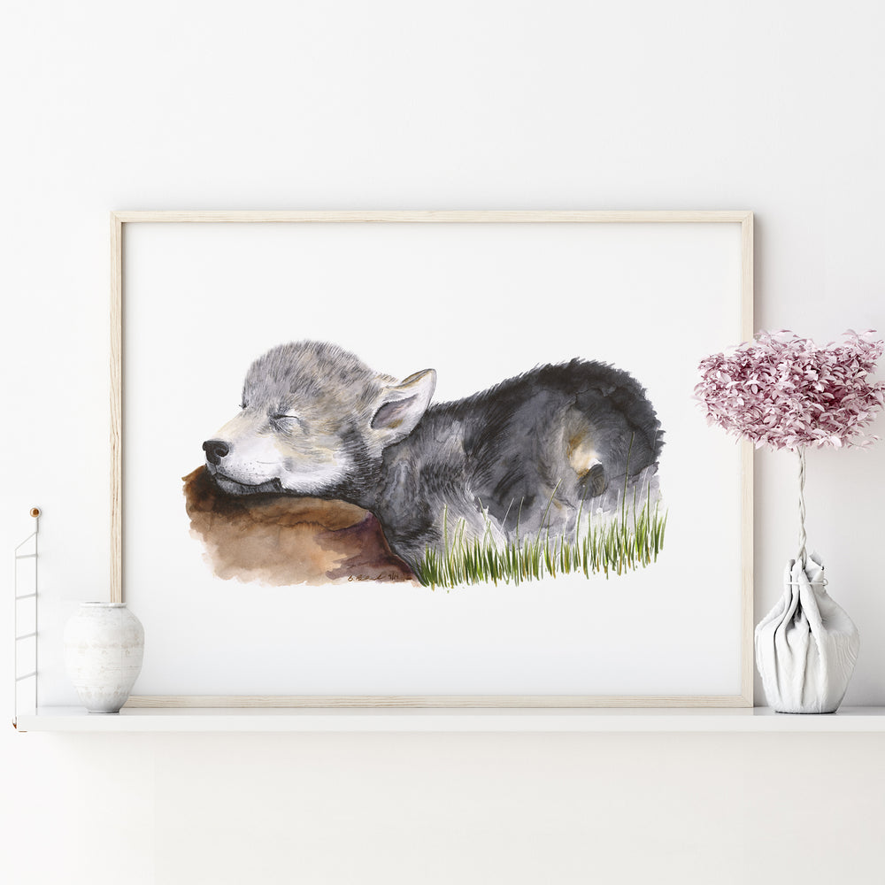 a painting of a wolf and cub laying on the grass