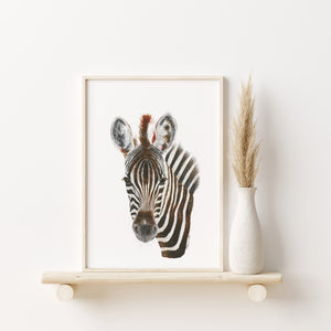 a picture of a zebra on a shelf next to a vase