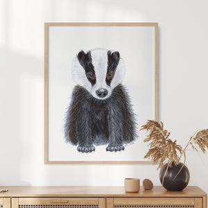 a watercolor of a badger in a frame on a wall