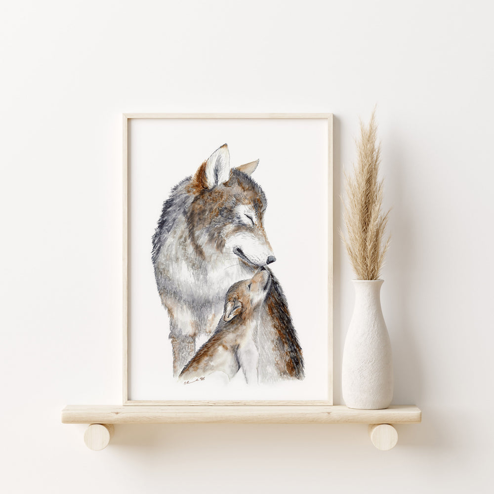 a picture of a wolf and her cub on a shelf