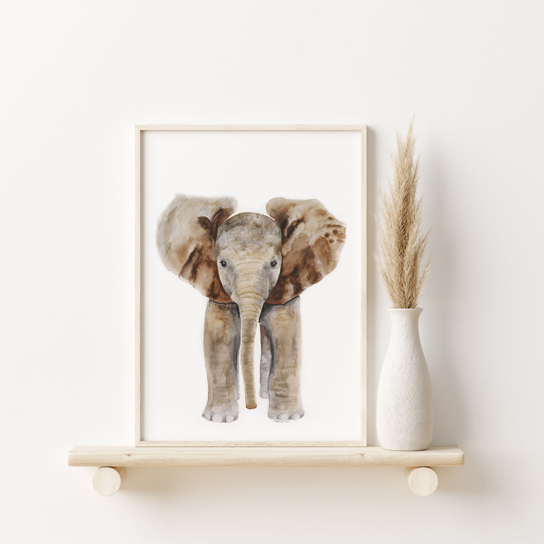 neutral nursery elephant print on shelf