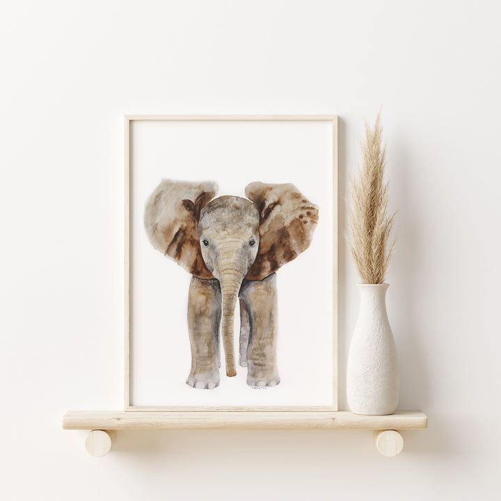 neutral nursery elephant print on shelf