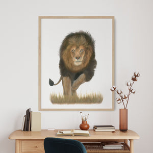 a picture of a male lion on a wall above a desk