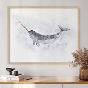a picture of a narwhal hanging on a wall