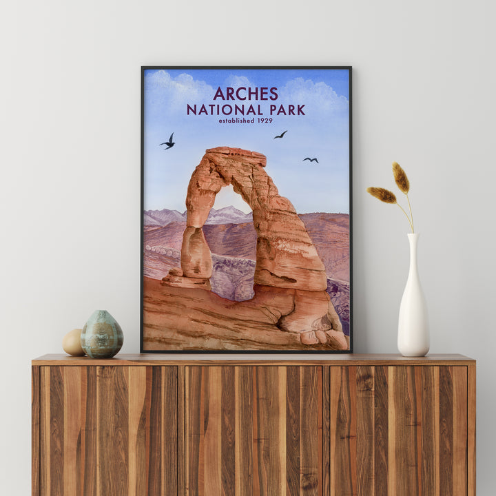 a picture of arches national park on a shelf