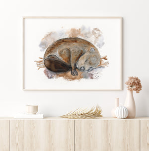 a painting of a sleeping animal on a wall