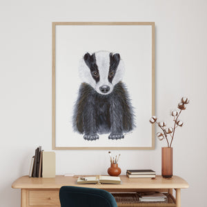 a picture of a badger on a wall above a desk