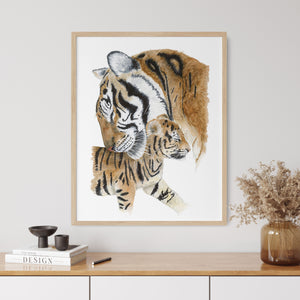 a picture of a mother tiger and her cub