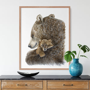 a painting of a bear and cub in a frame