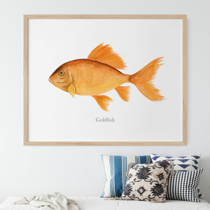 a painting of a goldfish hangs above a bed
