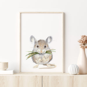 a picture of a mouse with a plant in its mouth