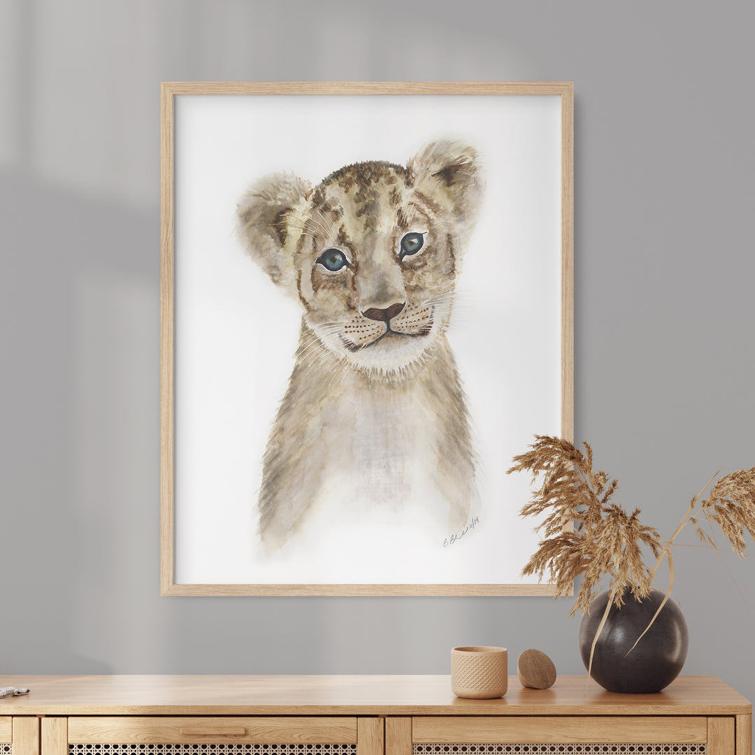baby lion watercolor print above crib safari nursery artwork