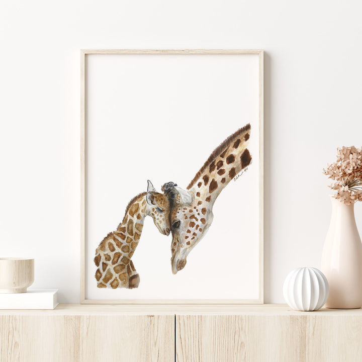 mom and baby giraffe watercolor print on shelf in safari nursery